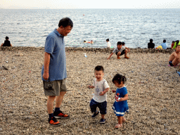 Max and his grandfather and cousin at Haijingyuan beach