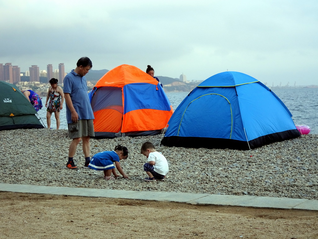 Max and his grandfather and cousin at Haijingyuan beach