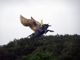 Flying Bull statue at the Dongshan Scenic Area, viewed from Binhai Road, at sunset