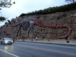 dalian_190 - 351 kb - 1024x768 - Rock with dinosaur skeletons at Binhai Road, at sunset Rock with dinosaur skeletons at Binhai Road, at sunset