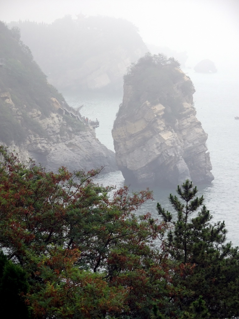 Rocks and trees at the Dalian Jinshitan Coastal National Geopark, viewed from the viewing point near the entrance