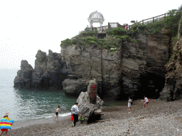 dalian_233 - 348 kb - 1024x768 - Beach, rock with inscription and pavilion at the Dalian Jinshitan Coastal National Geopark Beach, rock with inscription and pavilion at the Dalian Jinshitan Coastal National Geopark