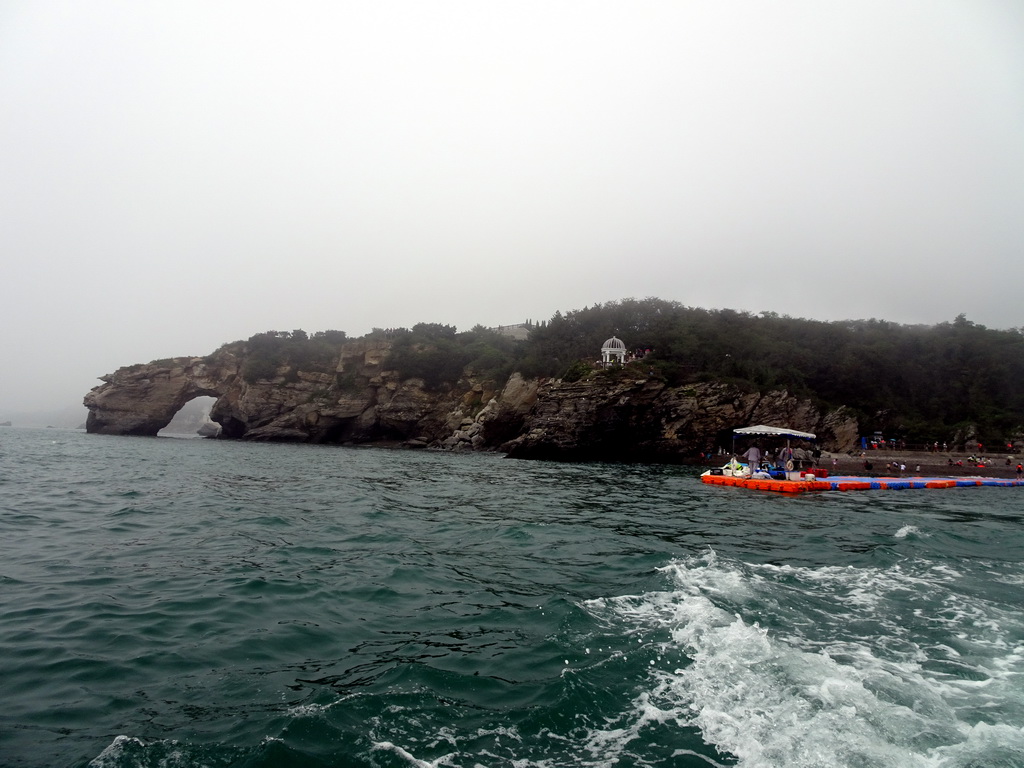 Rock gate and pavilion at the Dalian Jinshitan Coastal National Geopark, viewed from the ferry