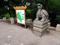 Map and turtle statue at the Dalian Jinshitan Coastal National Geopark