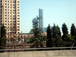 dalian_338 - 288 kb - 1024x768 - Skyscrapers at Shugang Road, viewed from the taxi Skyscrapers at Shugang Road, viewed from the taxi
