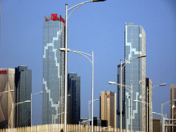 dalian_341 - 291 kb - 1024x768 - Skyscrapers in the city center, viewed from the taxi at Shugang Road Skyscrapers in the city center, viewed from the taxi at Shugang Road