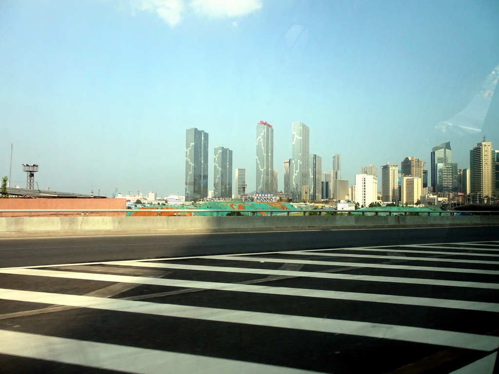 Skyscrapers in the city center, viewed from the taxi at Shugang Road