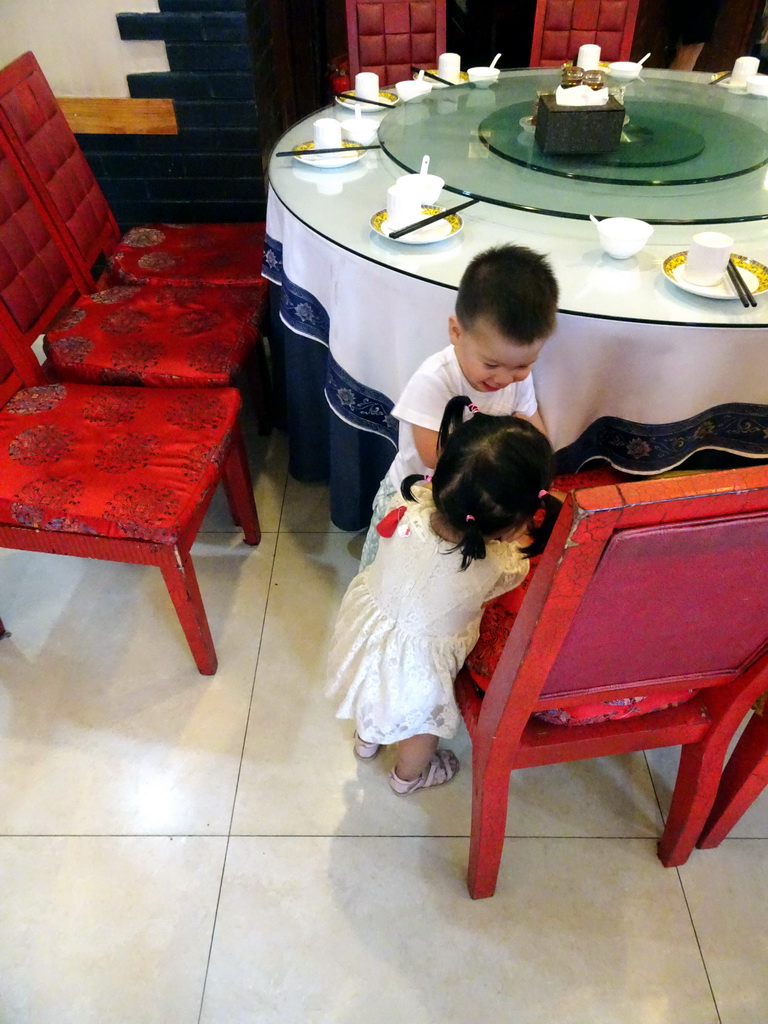 Max and his cousin at the Daqinghua Dumplings restaurant at Wuwu Street