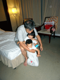 Max with his cousin and grandfather at his grandparents` room at the New Sea View International Hotel