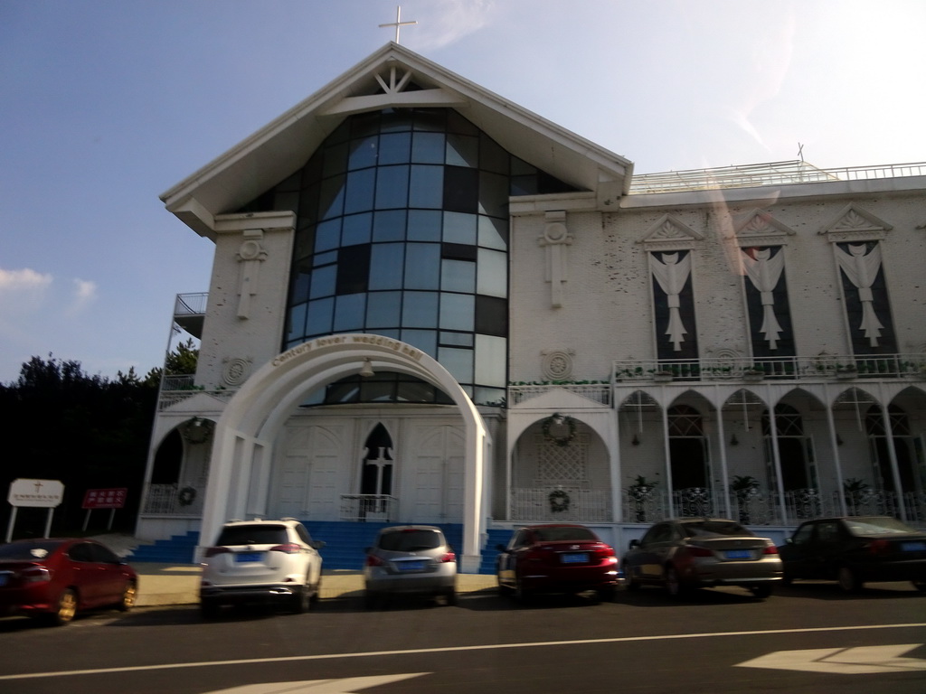 Front of the Century Lover Wedding Hall at Binhai Middle Road, viewed from the taxi