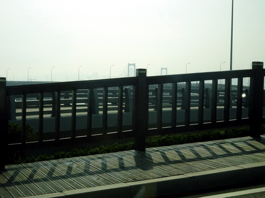 The Xinghai Bay Bridge, viewed from the taxi at Binhai West Road