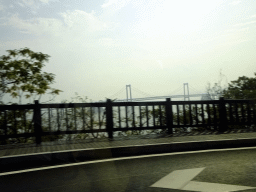 The Xinghai Bay Bridge, viewed from the taxi at Binhai West Road