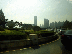 The southeast side of Xinghai Square with the Dalian Shell Museum, viewed from the taxi at Binhai West Road