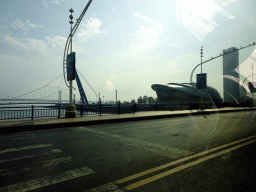 The southeast side of Xinghai Square with the Dalian Shell Museum and the Xinghai Bay Bridge, viewed from the taxi