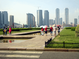 Xinghai Square, with skyscrapers and the Dalian Xinghai Convention & Exhibition Center at the north side, viewed from the taxi on the south side