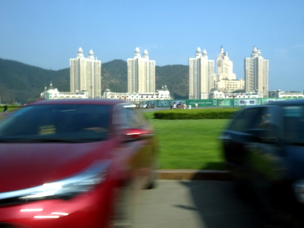 Xinghai Square with buildings at the east side, viewed from the taxi on the west side