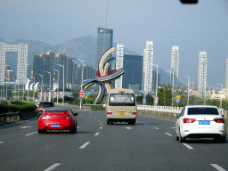 Piece of art at Zhenxing Road, Yinfan square and the building at the crossing of Heshan West Road and Jinma Road, viewed from the taxi