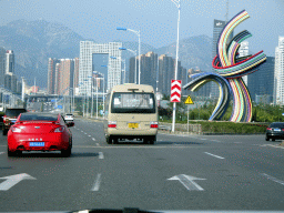Piece of art at Zhenxing Road, Yinfan square and the building at the crossing of Heshan West Road and Jinma Road, viewed from the taxi