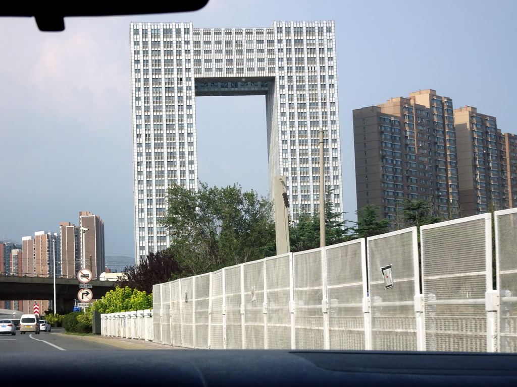 Building at the crossing of Heshan West Road and Jinma Road, viewed from the taxi