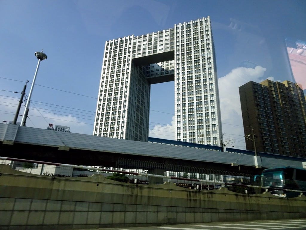 Building at the crossing of Heshan West Road and Jinma Road, viewed from the taxi