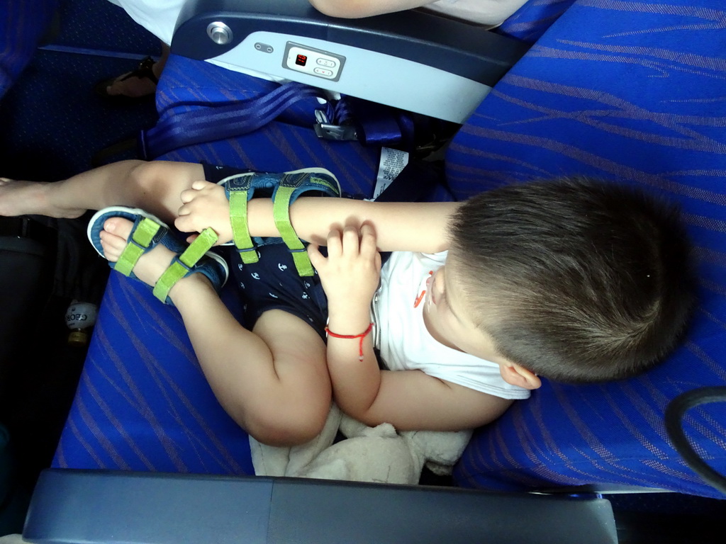 Max in the airplane to Beijing