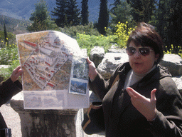 Our tour guide with a map of ancient Delphi