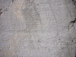 Ancient Greek inscriptions on a wall