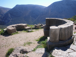 Remnants of two half-circle shaped walls alongside the Sacred Way