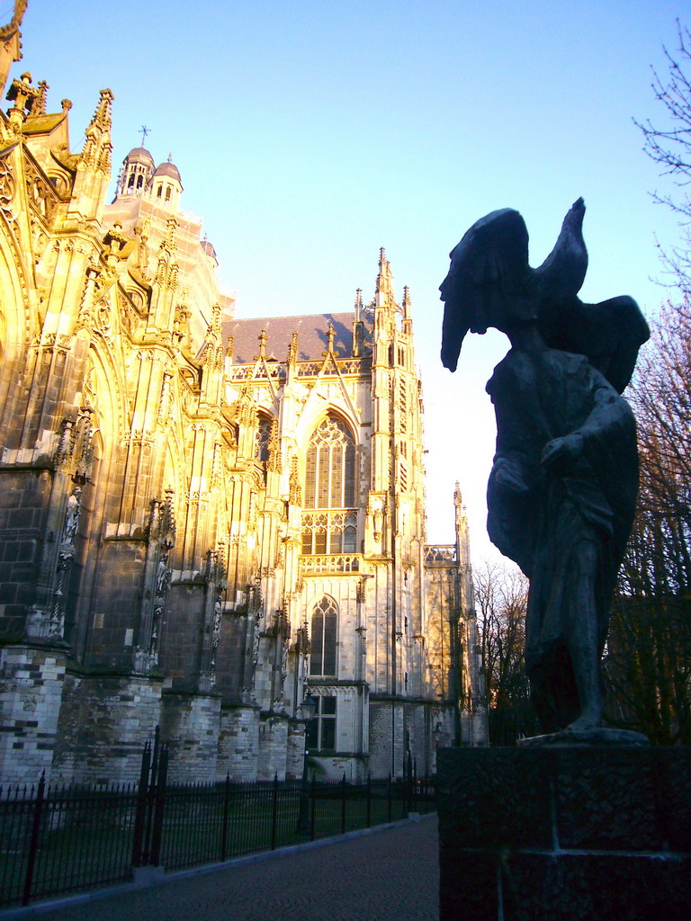 Southwest side of St. John`s Cathedral and a statue of Sint John with an eagle, for mayor Loeff