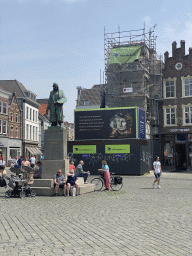 Statue of Hieronymus Bosch and the Huis van Bosch building, under renovation, at the Markt square