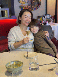 Miaomiao and Max with a glass of champagne at the Sense Restaurant