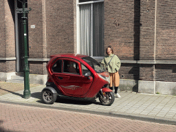 Miaomiao with a small car at the Papenhulst street