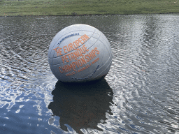 Ball with information on the European Petanque Championships 2022 in the Stadsgracht canal at the Zuiderpark