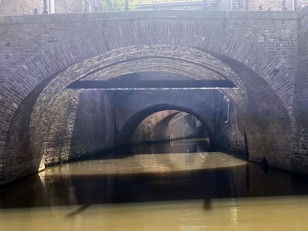 Bridge over the Binnendieze river at the Uilenburgstraatje street, viewed from the tour boat