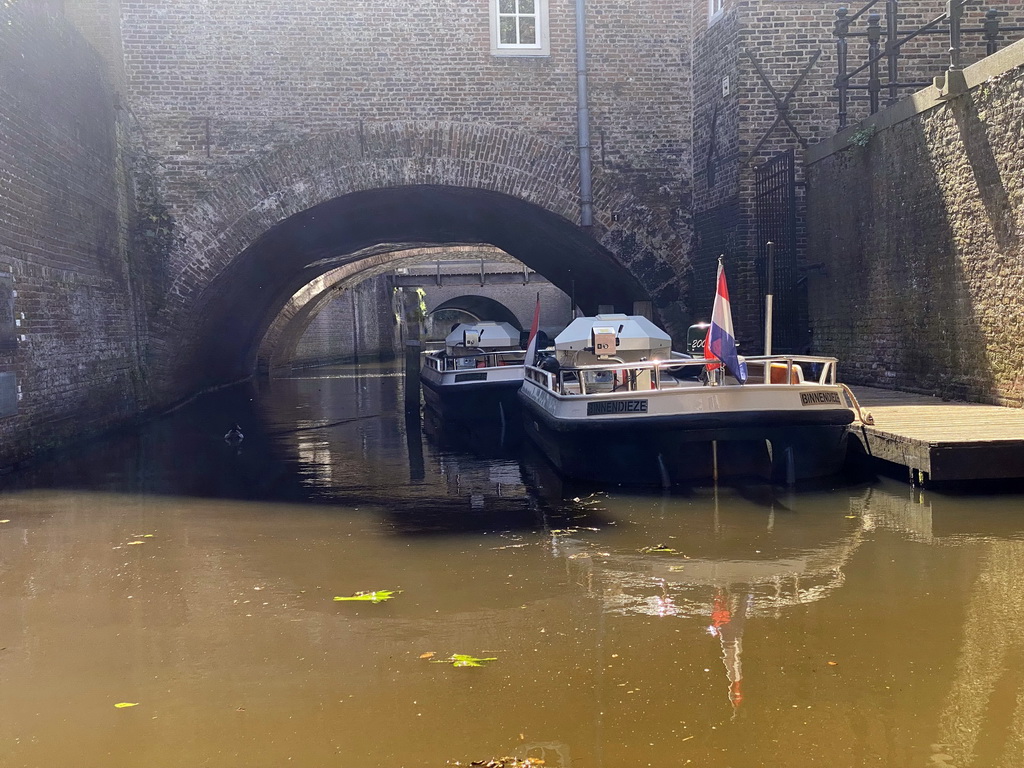 Boats on the Binnendieze river, viewed from the tour boat