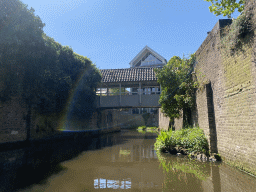 Bridge over the Binnendieze river at the Uilenburg street, viewed from the tour boat