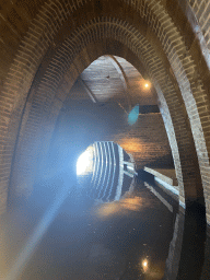 The Kruisbroedershekel tunnel from the Binnendieze river to the Singelgracht canal, viewed from the tour boat