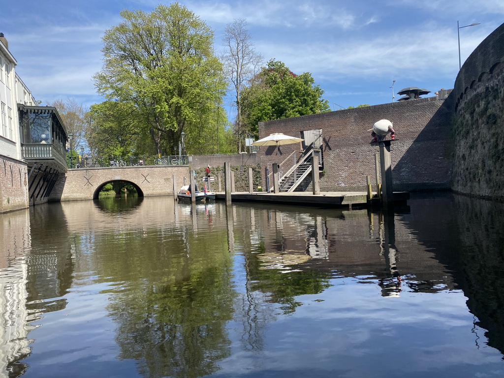 The Binnendieze river and the other boarding point of the boat tour at the Oude Dieze street, viewed from the tour boat