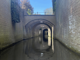 Bridges over the Binnendieze canal near the Zuidwal street, viewed from the tour boat