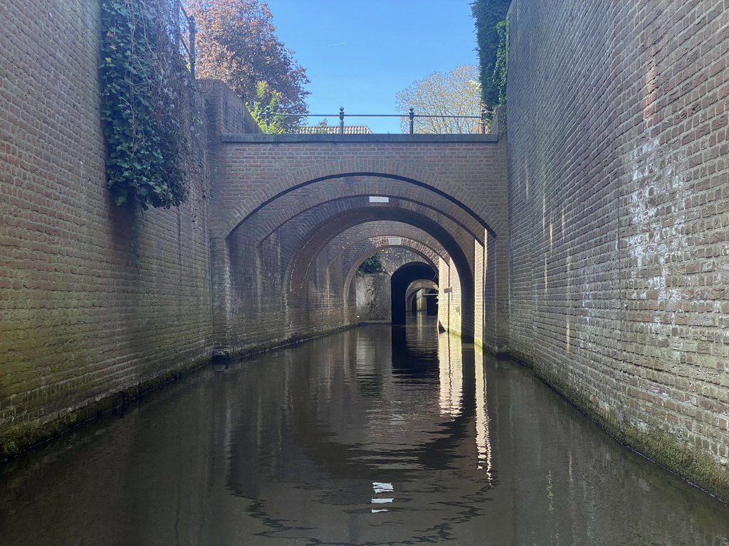 Bridges over the Binnendieze canal near the Zuidwal street, viewed from the tour boat