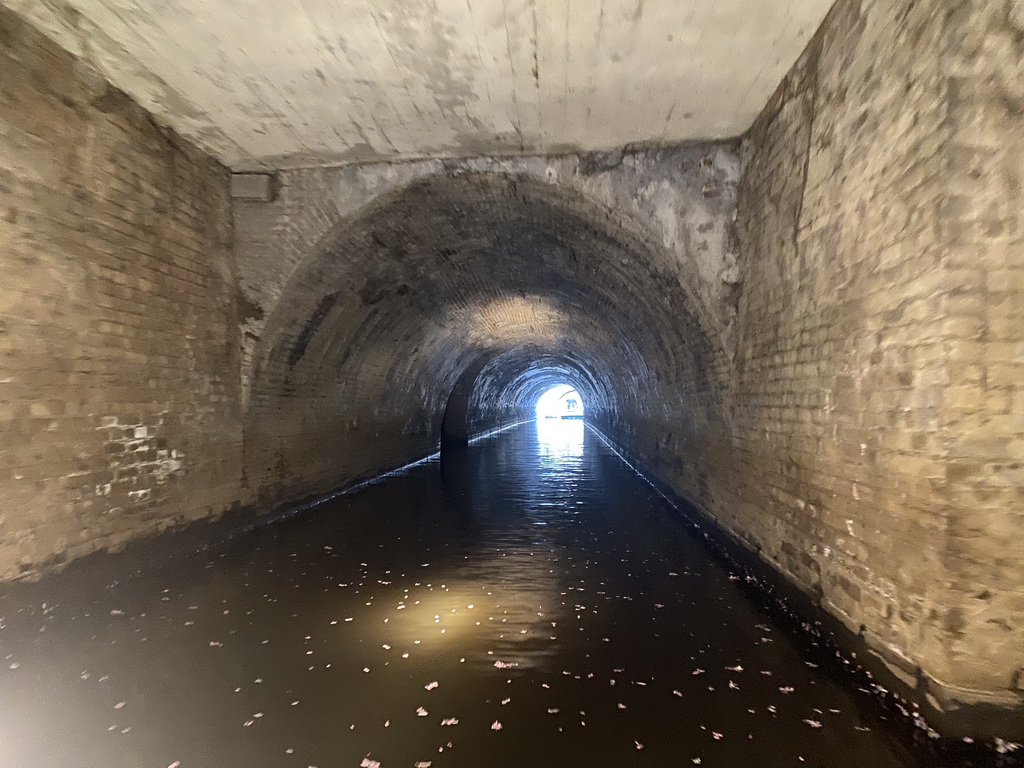 Tunnel over the Binnendieze canal near the Verwersstraatje street, viewed from the tour boat