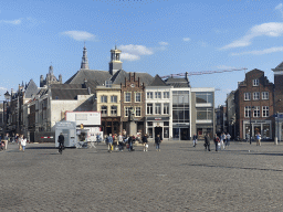 The Markt square with a statue of Hieronymus Bosch and the towers of the Grote Kerk church and St. John`s Cathedral