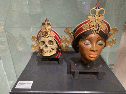 Skull and woman`s head from the Spookslot attraction at the Efteling theme park, at the Efteling exhibition at the Noordbrabants Museum, with explanation