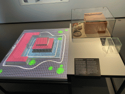 Scale model of the Temple of Empel and pottery at the `Het Verhaal van Brabant` exhibition at the Wim van der Leegtezaal room at the Noordbrabants Museum, with explanation