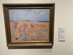 Painting `Landscape with wheat sheaves, Laren` by Jan Sluijters at the Noordbrabants Museum, with explanation