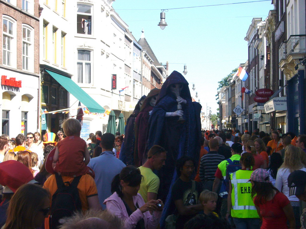 People in medieval costumes during the Queen`s Day festivities at the Hinthamerstraat street