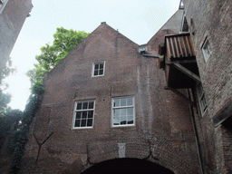 Back sides of houses at the Binnendieze river, viewed from the tour boat