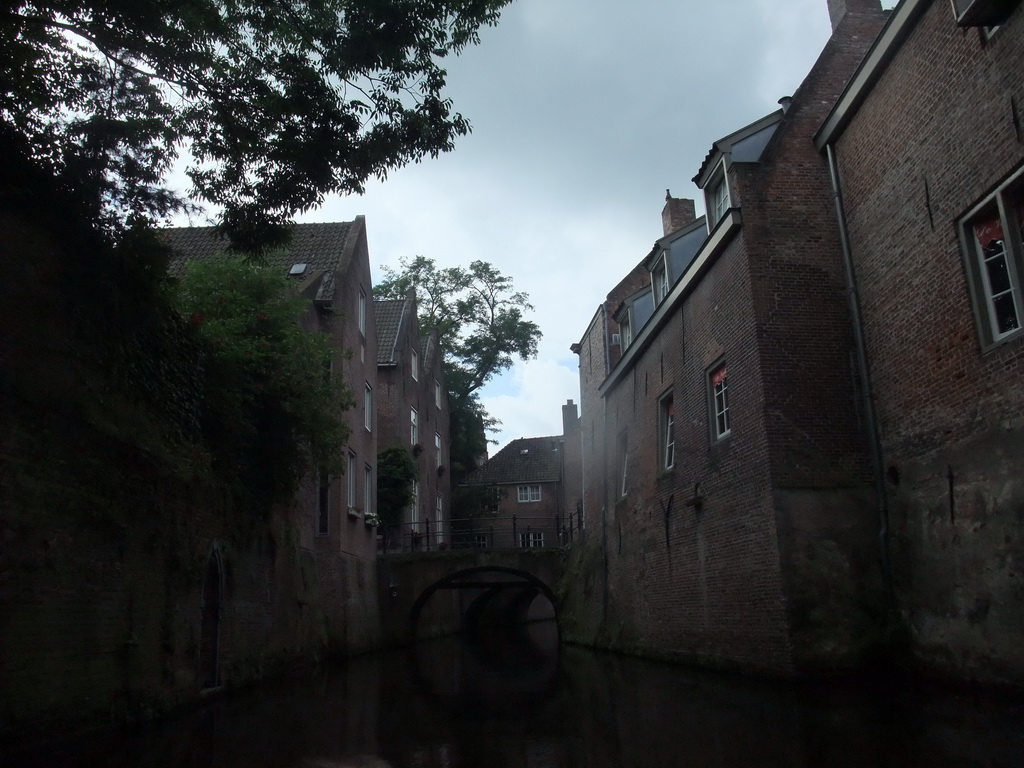 Bridges and houses at the Binnendieze river, viewed from the tour boat