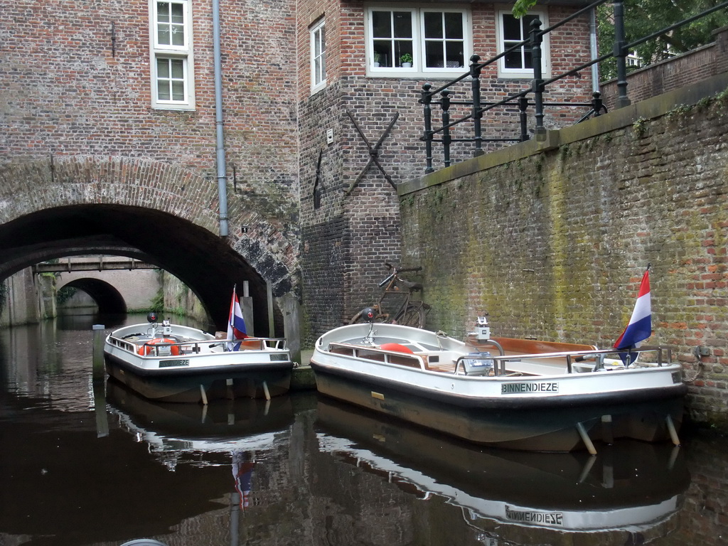 Boats in the Binnendieze river, viewed from the tour boat