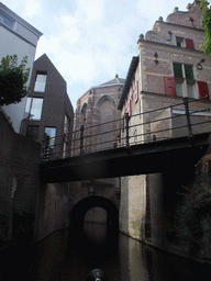 Bridge over the Binnendieze river and tunnel under the St. Catharina Church, viewed from the tour boat